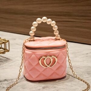 Elegant Pink Quilted Handbag with Pearl Handle
